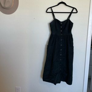 Dark green Urban Outfitters corduroy midi dress.